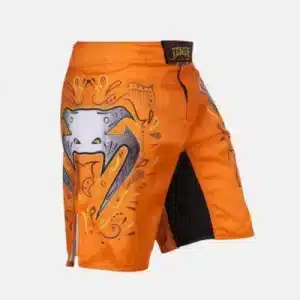 Venum Santa Muerte 2.0 fight shorts orange left right logo view off white bg